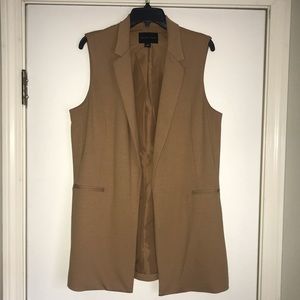 Lightly worn camel colored business vest!